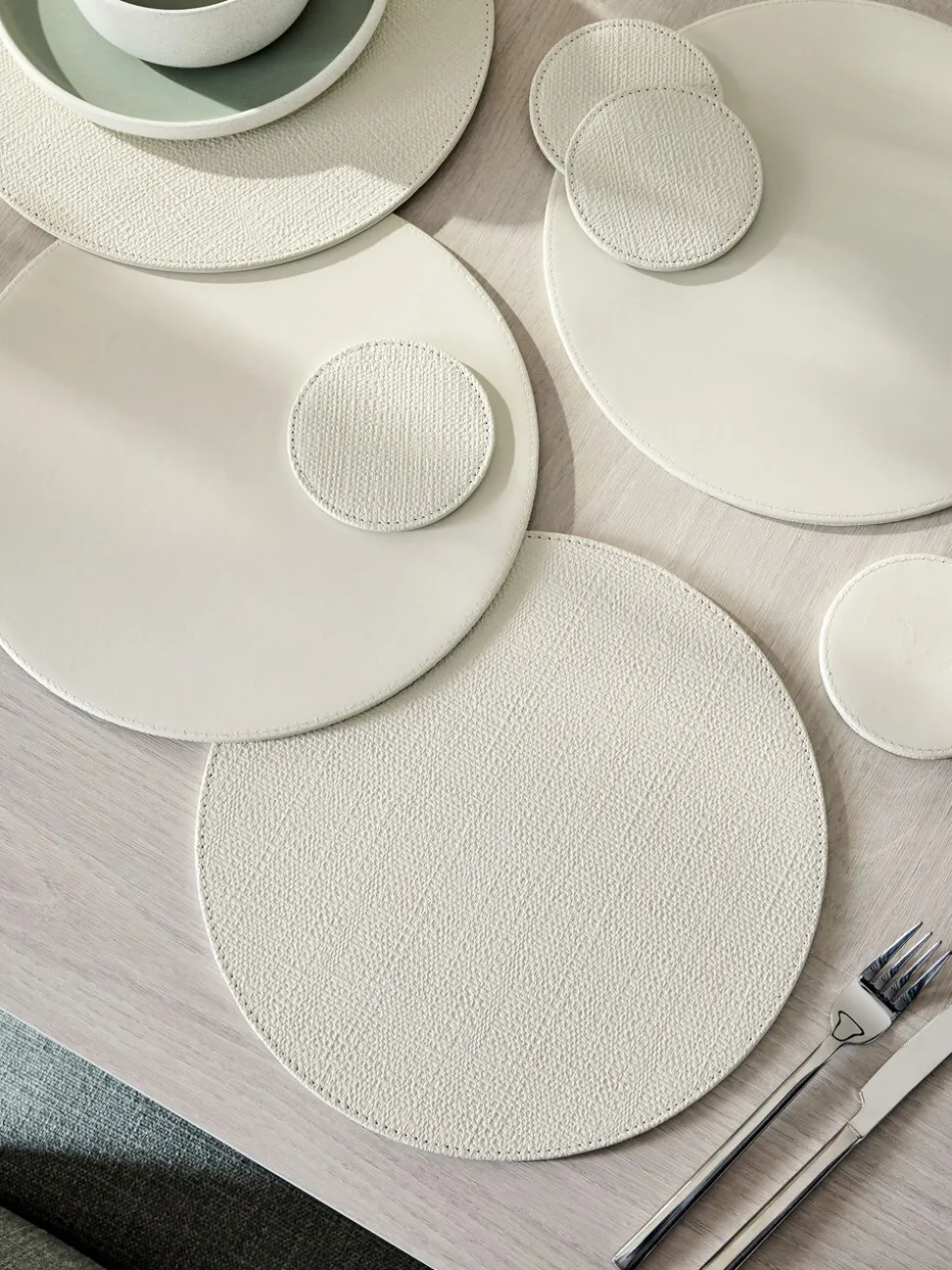 Set van 4 omkeerbare placemats en onderzetters van imitatieleer