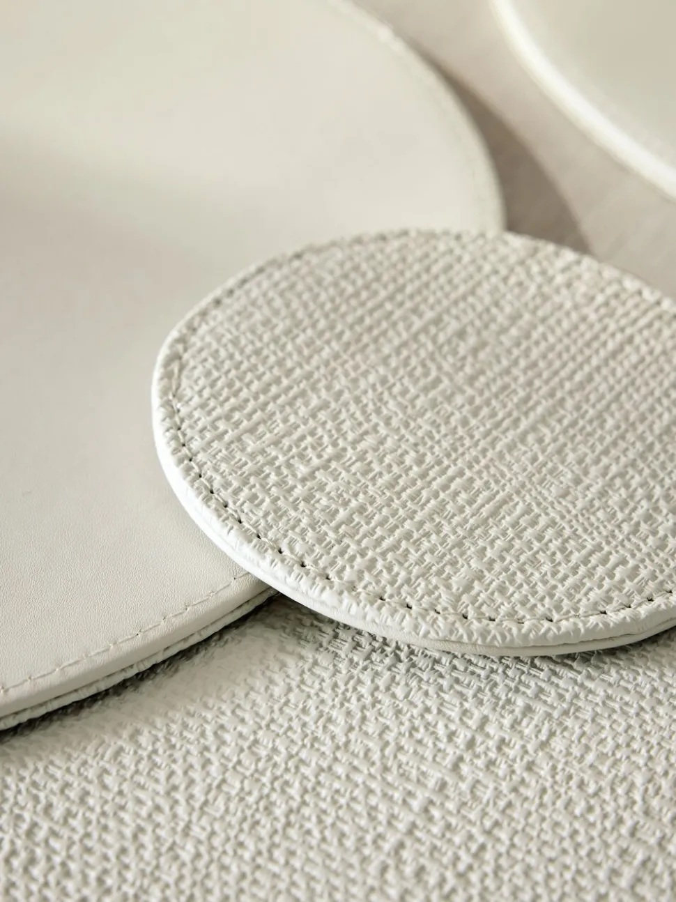 Set van 4 omkeerbare placemats en onderzetters van imitatieleer