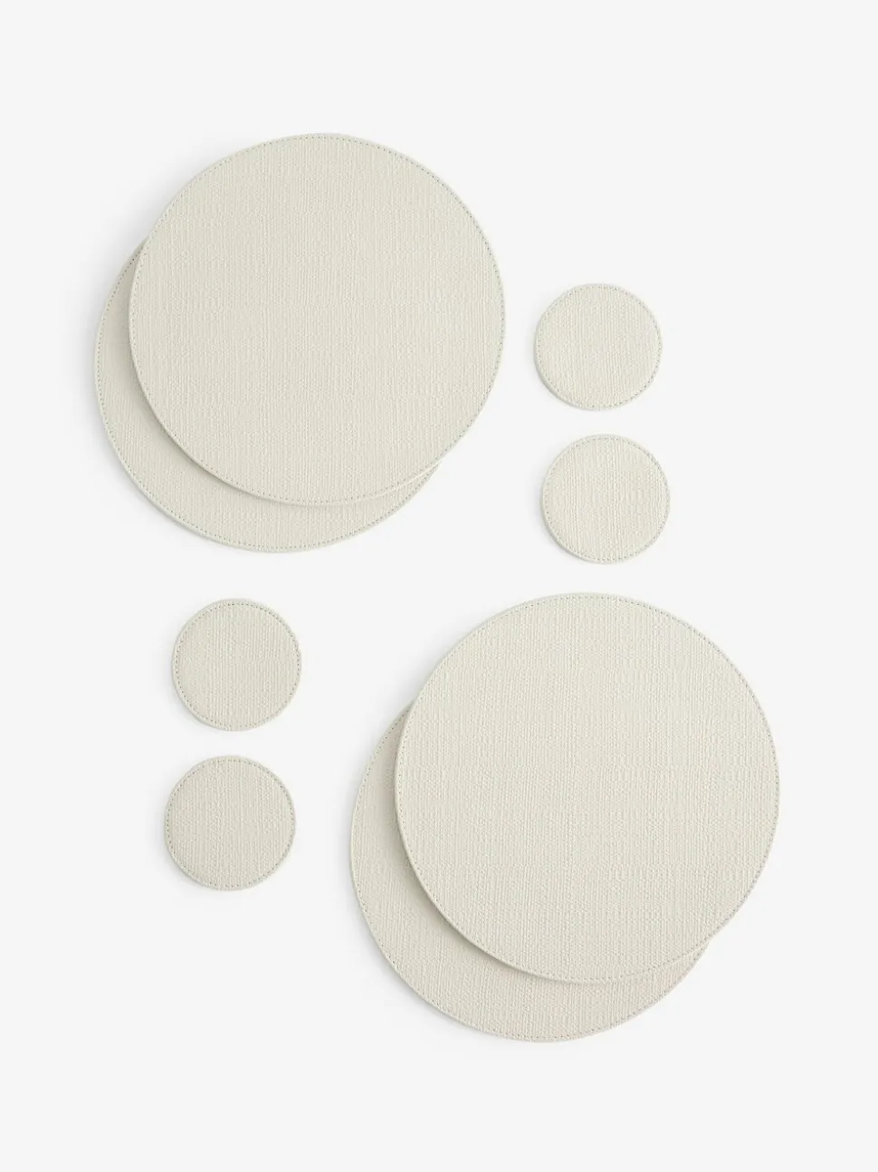 Set van 4 omkeerbare placemats en onderzetters van imitatieleer
