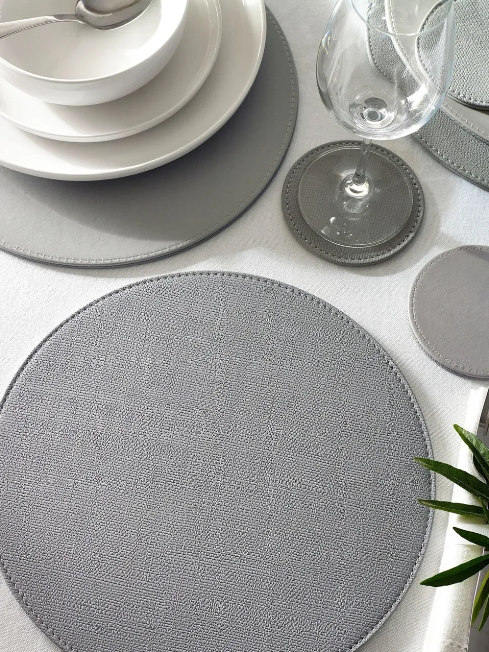 Set van 4 omkeerbare placemats en onderzetters van imitatieleer