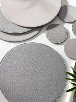 Set van 4 omkeerbare placemats en onderzetters van imitatieleer