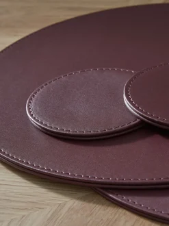 Set van 4 omkeerbare placemats en onderzetters van imitatieleer