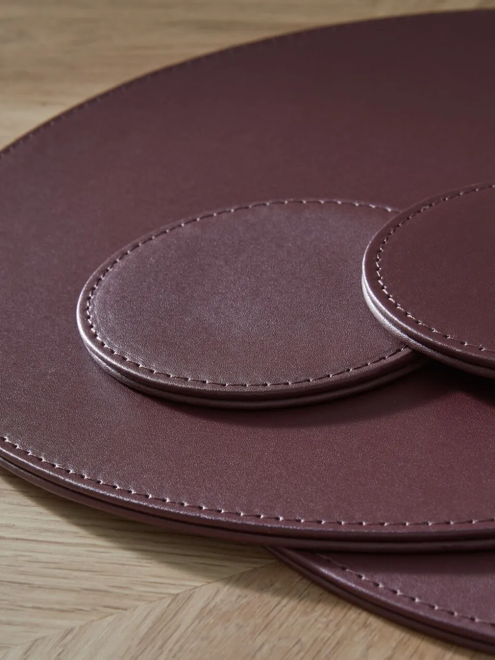 Set van 4 omkeerbare placemats en onderzetters van imitatieleer