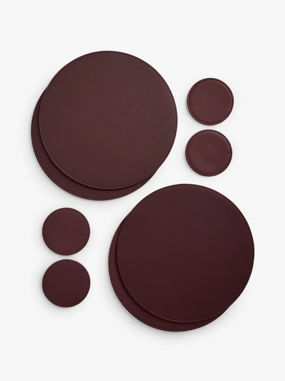 Set van 4 omkeerbare placemats en onderzetters van imitatieleer