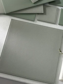 Set van 4 omkeerbare placemats en onderzetters van imitatieleer