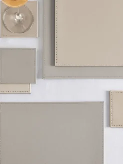 Set van 4 omkeerbare placemats en onderzetters van imitatieleer