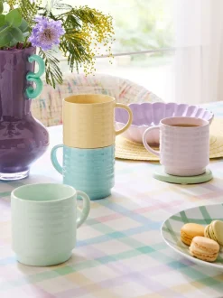 Set van 4 pastelkleurige gestapelde mokken met ribbels