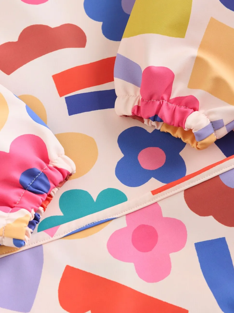 Stampy Bloemenprint - Slabbetje met mouwen voor spenen en voeden