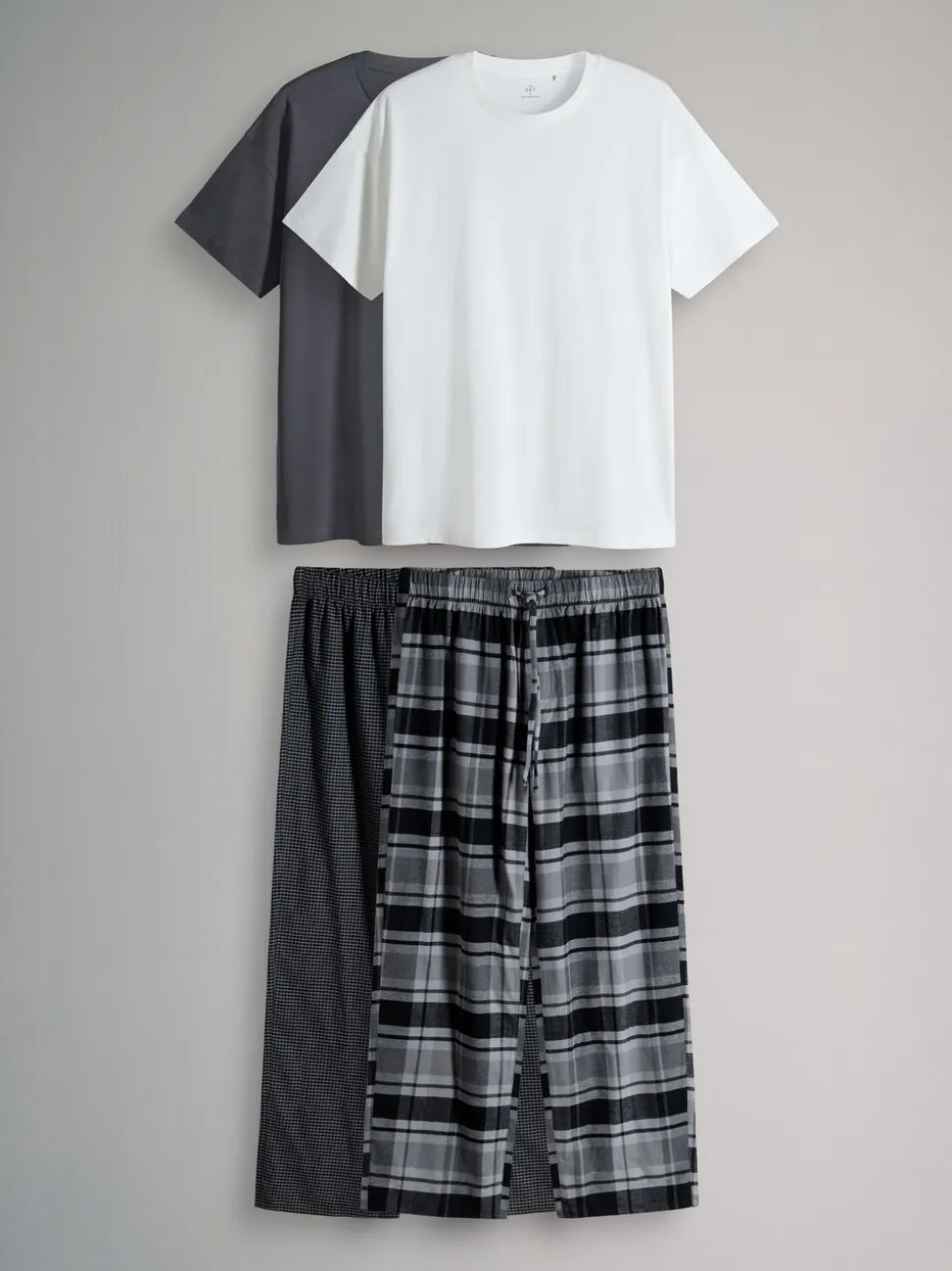 The Set 2 Pack Jersey T-Shirt and Flannel Pyjamas
