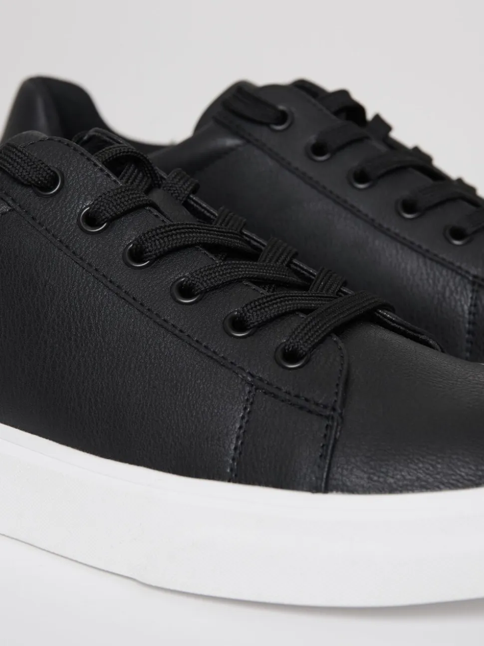 Threadbare Court Trainers