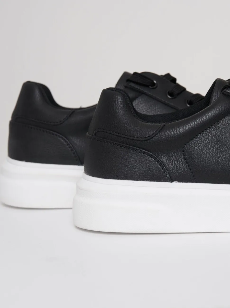 Threadbare Court Trainers