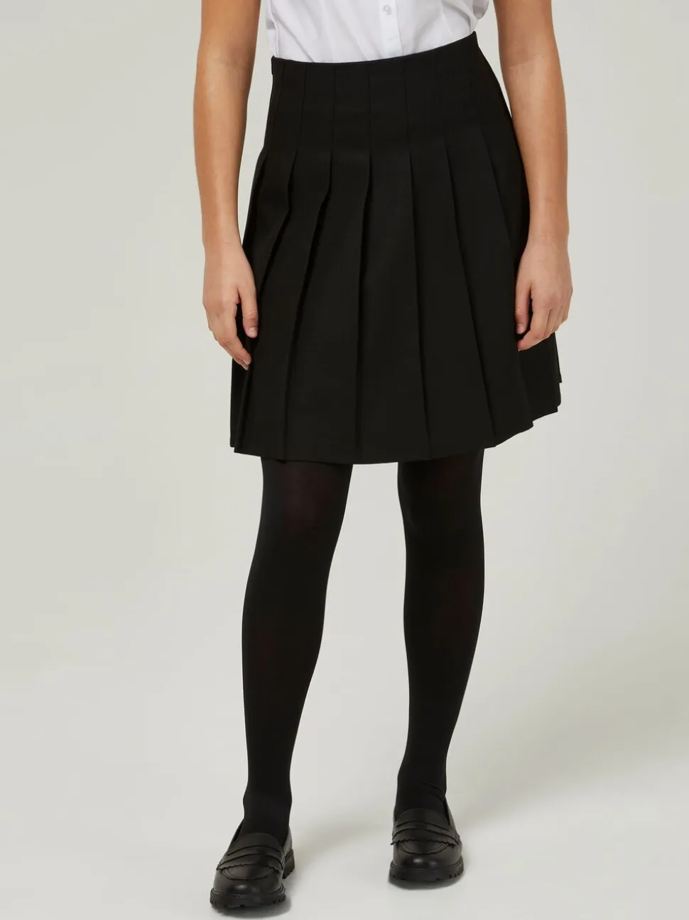 Trutex Zwarte 20" schoolrok met vaste plooien en stiksels (11-17 jaar)