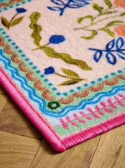 Wasbare deurmat met heldere bloemenprint