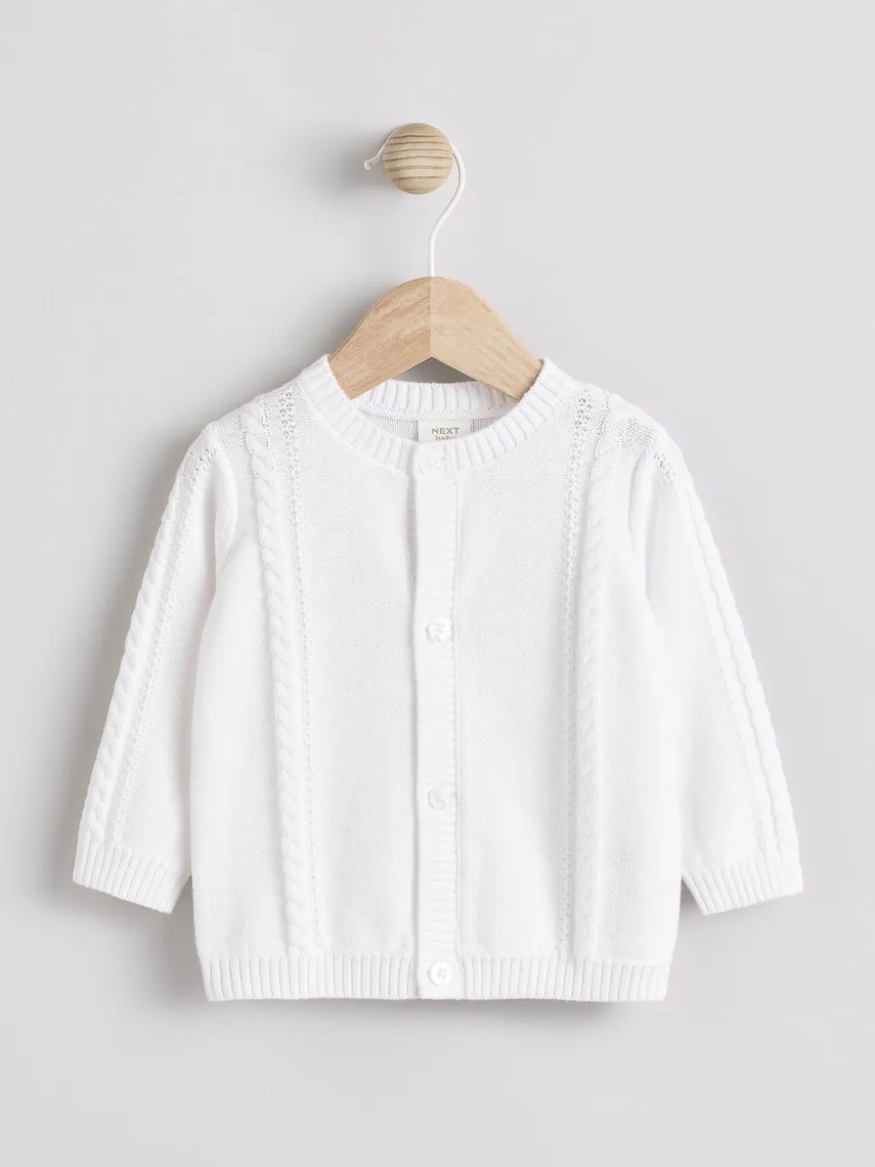Wit - Kabelgebreid babyvestje