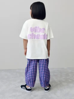 Wit - Oversized T-shirt met grafische print (3-16jr)