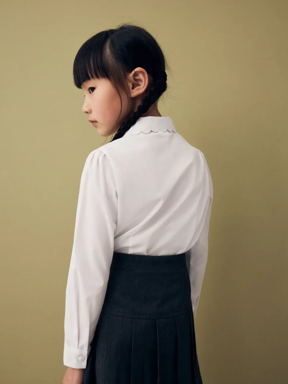 Wit - Schoolblouse met lange mouwen en gegolfde kantafwerking (3-14 jr)