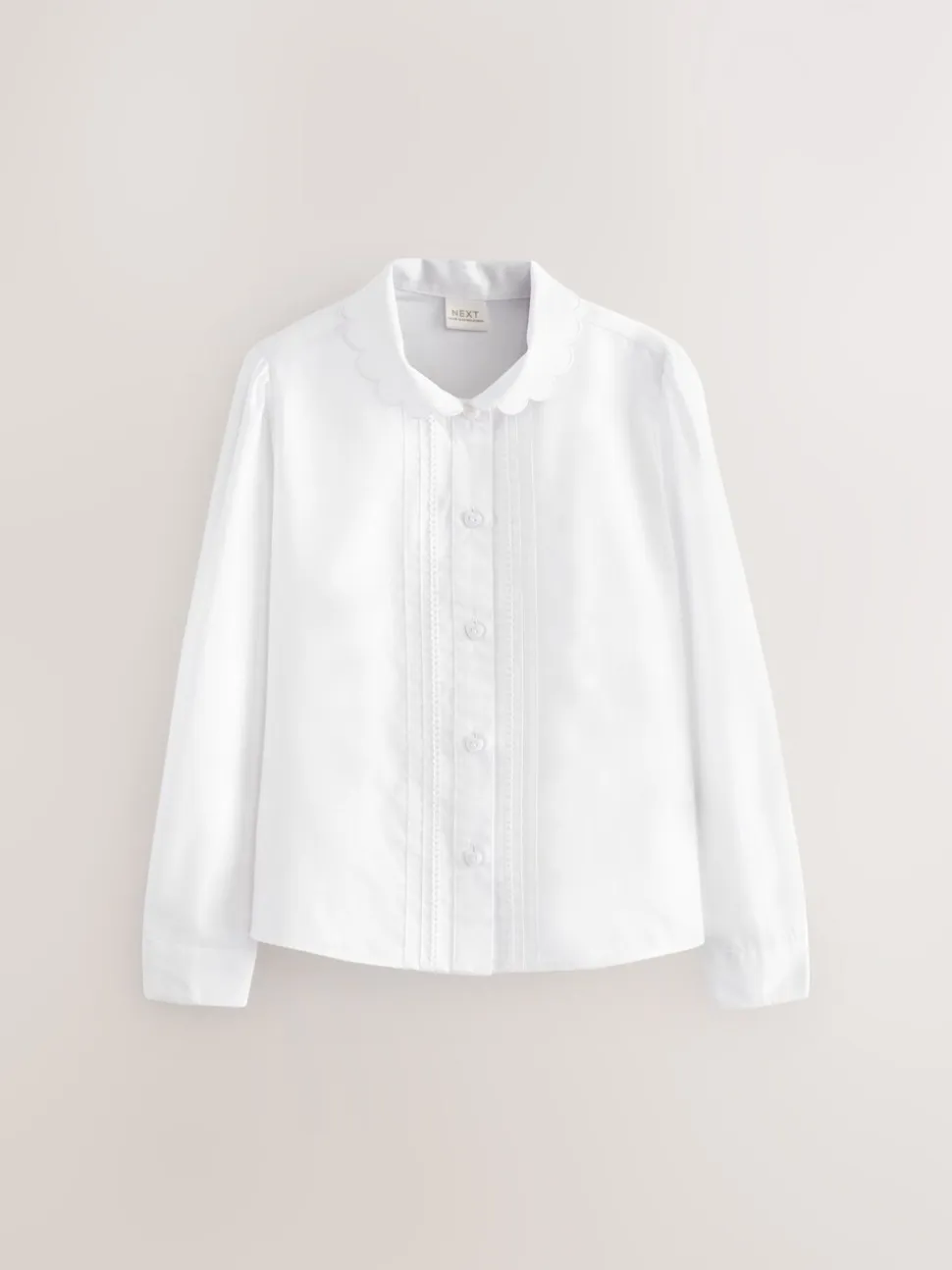 Wit - Schoolblouse met lange mouwen en gegolfde kantafwerking (3-14 jr)