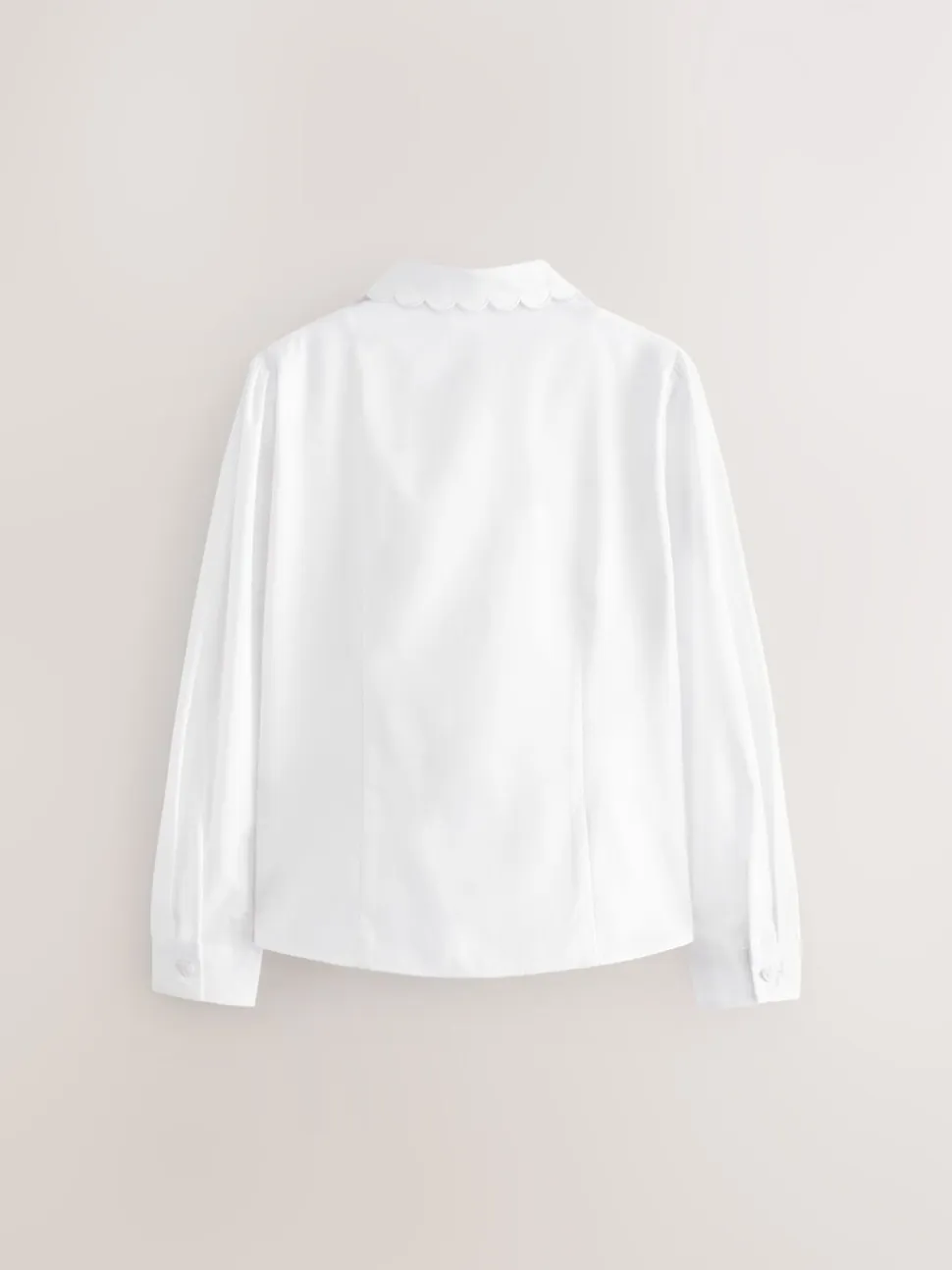 Wit - Schoolblouse met lange mouwen en gegolfde kantafwerking (3-14 jr)