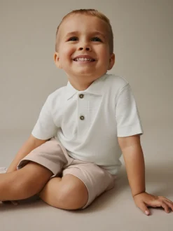 Wit - Set van poloshirt met textuur en korte mouwen en shorts (3 mnd - 7 jr)
