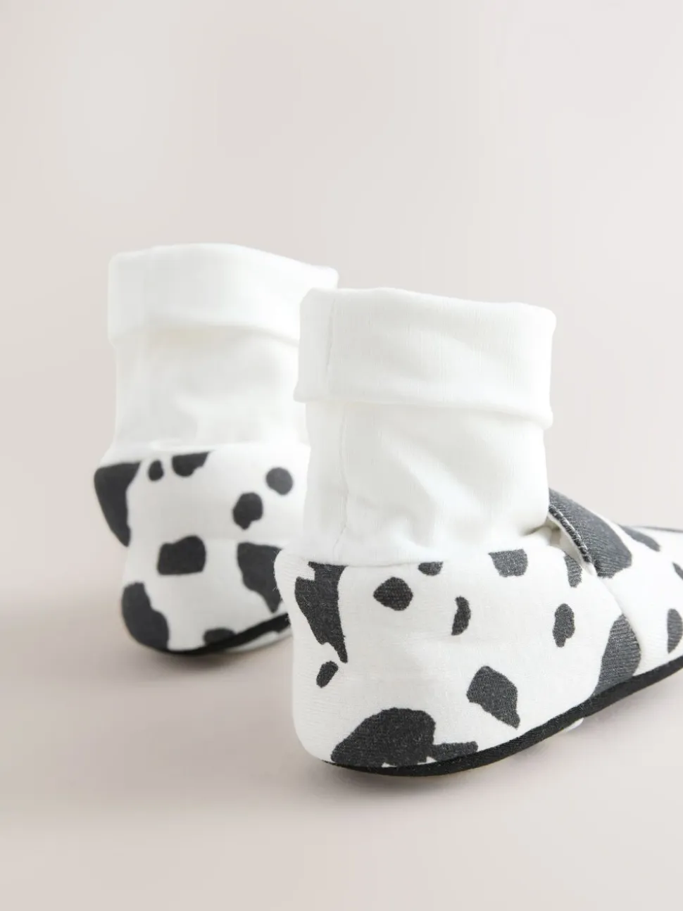 Wit/Zwart Koeienprint - Babyschoenen met sok-bovenkant (0-18mnd)