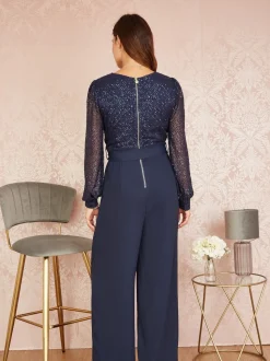 Yumi - Jumpsuit met lovertjes en lange mouwen