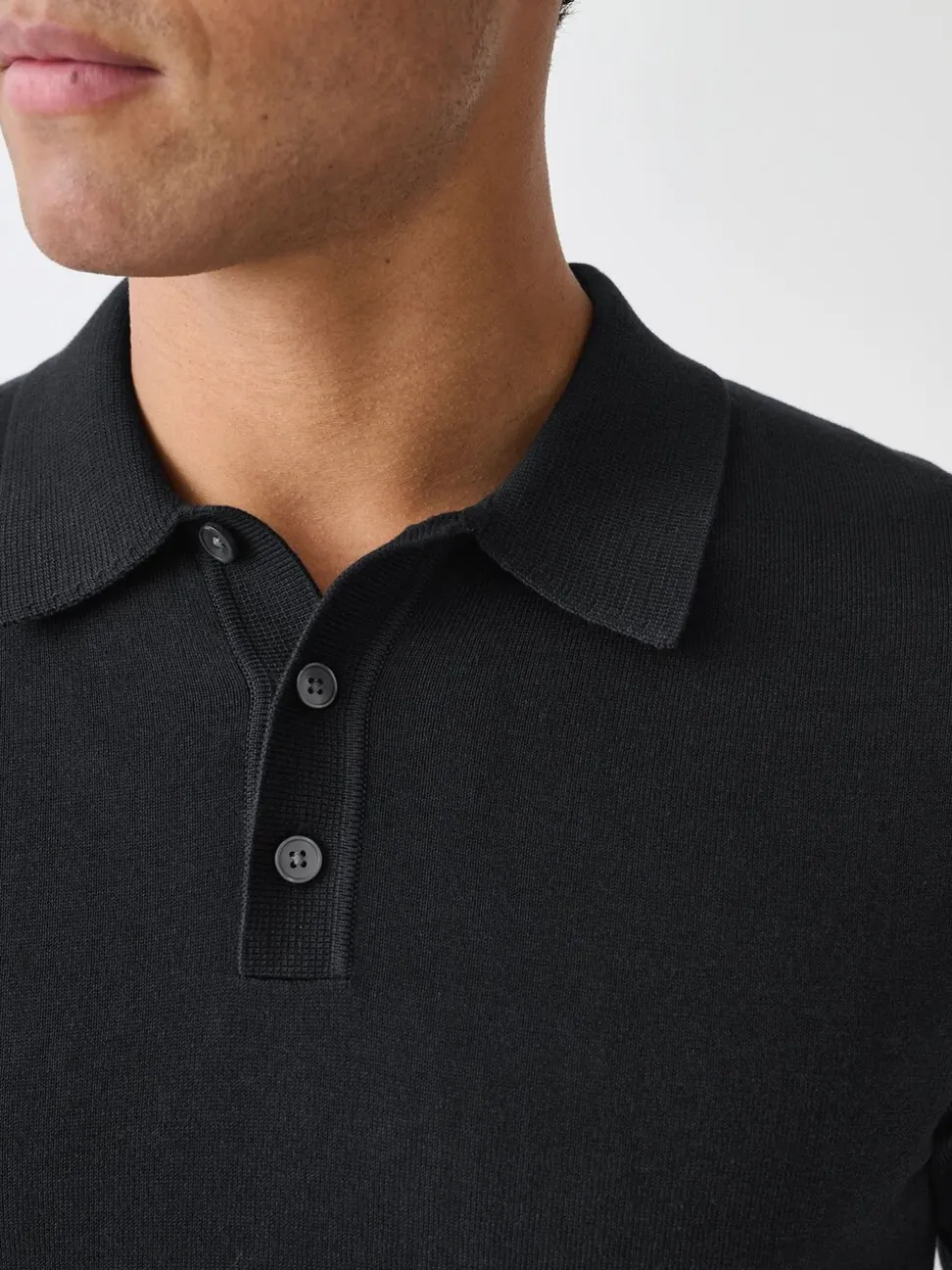 Zwart - Aansluitend - Gebreid poloshirt met hoog katoengehalte en korte mouwen