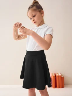 Zwart - Aantrekskirt voor school met jersey stretch (3-17jr)