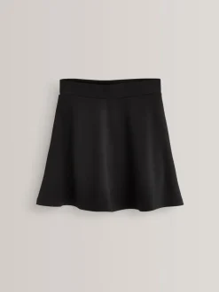 Zwart - Aantrekskirt voor school met jersey stretch (3-17jr)