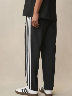 Zwart - adidas Essentials 3-Strepen Stanford joggingbroek met open zoom