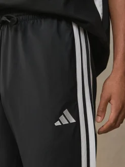 Zwart - adidas Essentials 3-Strepen Stanford joggingbroek met open zoom