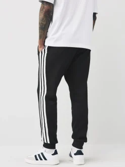 Zwart - adidas Essentials fleece joggingbroek met 3 strepen