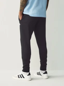 Zwart - adidas Essentials Feelcozy fleece joggingbroek