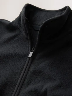 Zwart - Fleece jack met rits en zakken (3-16 jr)