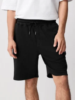 Zwart - Geborstelde jersey shorts met ritszakken