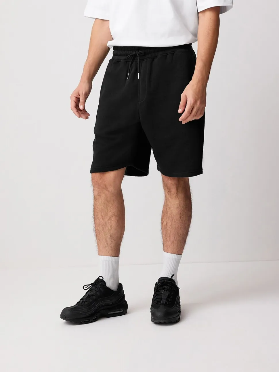 Zwart - Geborstelde jersey shorts met ritszakken