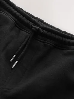 Zwart - Geborstelde jersey shorts met ritszakken