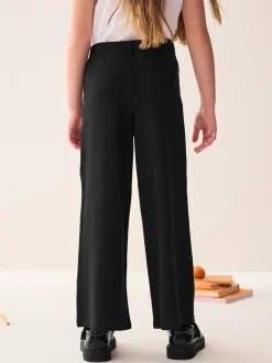 Zwart - Jersey broek met wijde pijpen, stretch en hoog katoengehalte (3-17jr)