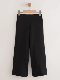 Zwart - Jersey broek met wijde pijpen, stretch en hoog katoengehalte (3-17jr)