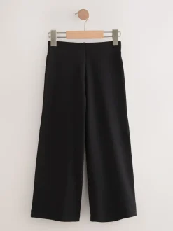 Zwart - Jersey broek met wijde pijpen, stretch en hoog katoengehalte (3-17jr)