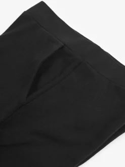 Zwart - Jersey broek met wijde pijpen (3-16 jr)