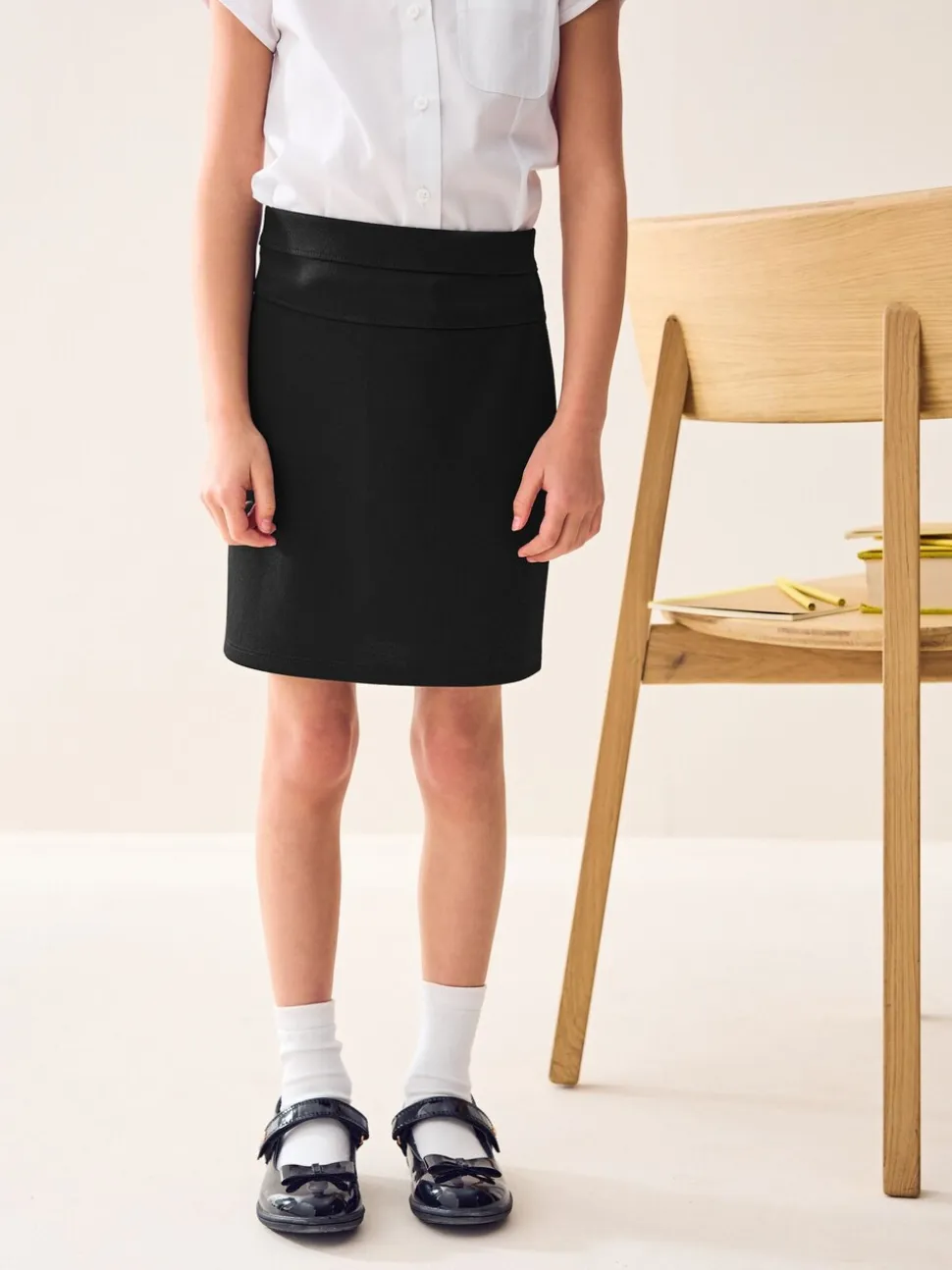 Zwart - Jersey stretch schoolkokerrok met aantrekkoord (3 - 18 jr)