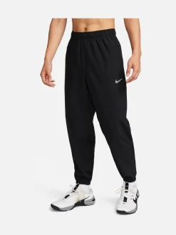 Zwart - Nike Dri-FIT Form trainingsbroek met taps toelopende pijpen