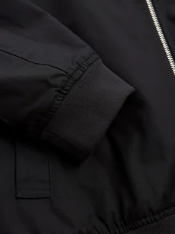 Zwart - Regenbestendig Harrington jack met geruite voering