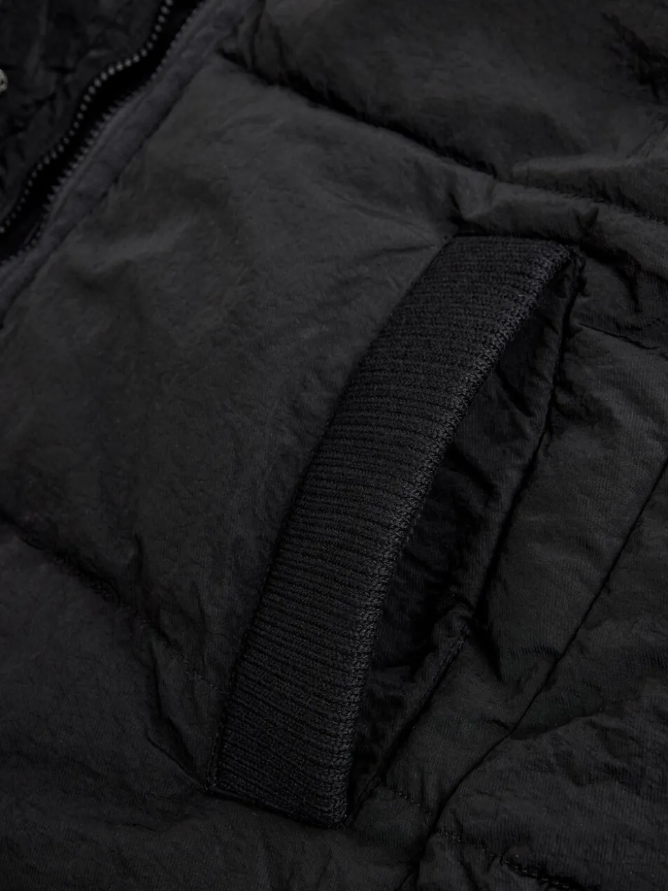 Zwart - Regenbestendige bodywarmer met capuchon en gebreide kraag