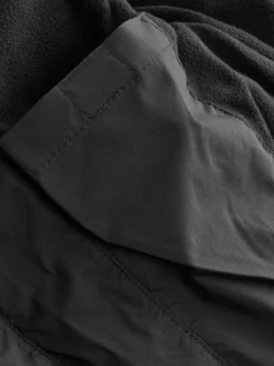 Zwart - Regenbestendige gewatteerde jas met microfleece voering (3-17jr)