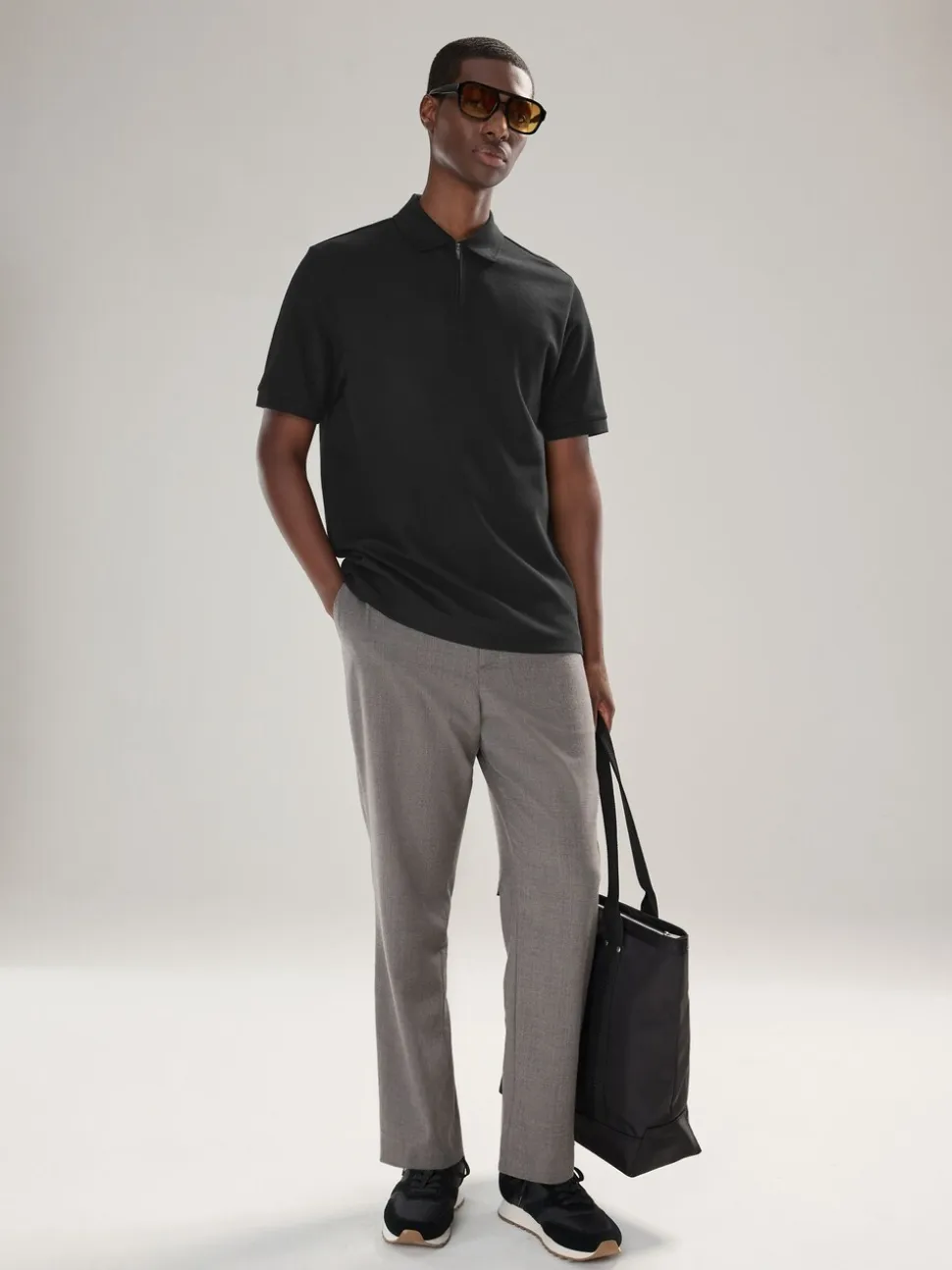Zwart - Smart poloshirt met textuur en rits