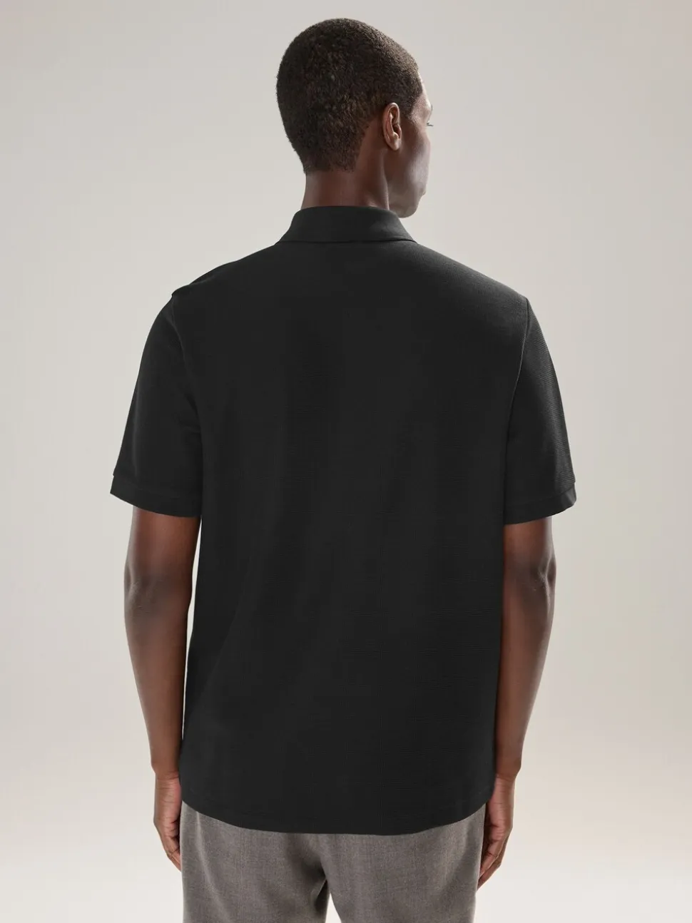 Zwart - Smart poloshirt met textuur en rits