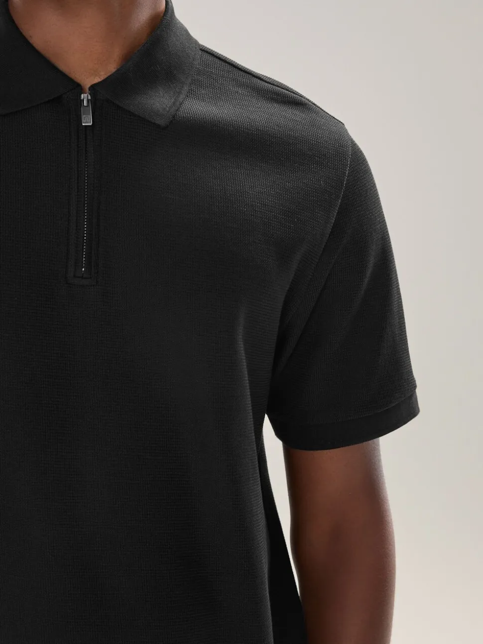 Zwart - Smart poloshirt met textuur en rits