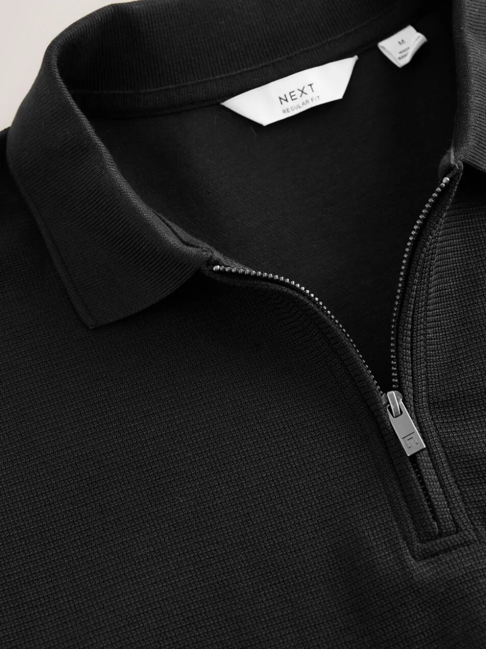Zwart - Smart poloshirt met textuur en rits