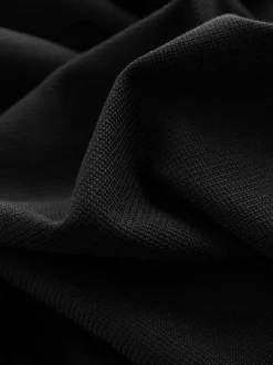 Zwart - Smart poloshirt met textuur en rits